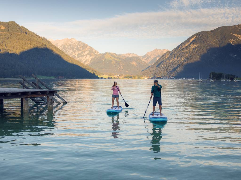 StandUpPaddling on the shores of Lake Achensee in Tyrol Active